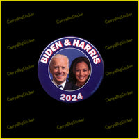 Biden and Harris 2024 Button with pin on back. Blue. Features photo of faces of Joe Biden and Kamala Harris.