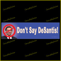 Bumper Sticker or Bumper Magnet says, Don't Say DeSantis! Features portrait of DeSantis with his face partly covered with a red circle and slash.