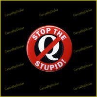 Pinback button says, Stop the Stupid! Features red circle with slash through the letter Q.